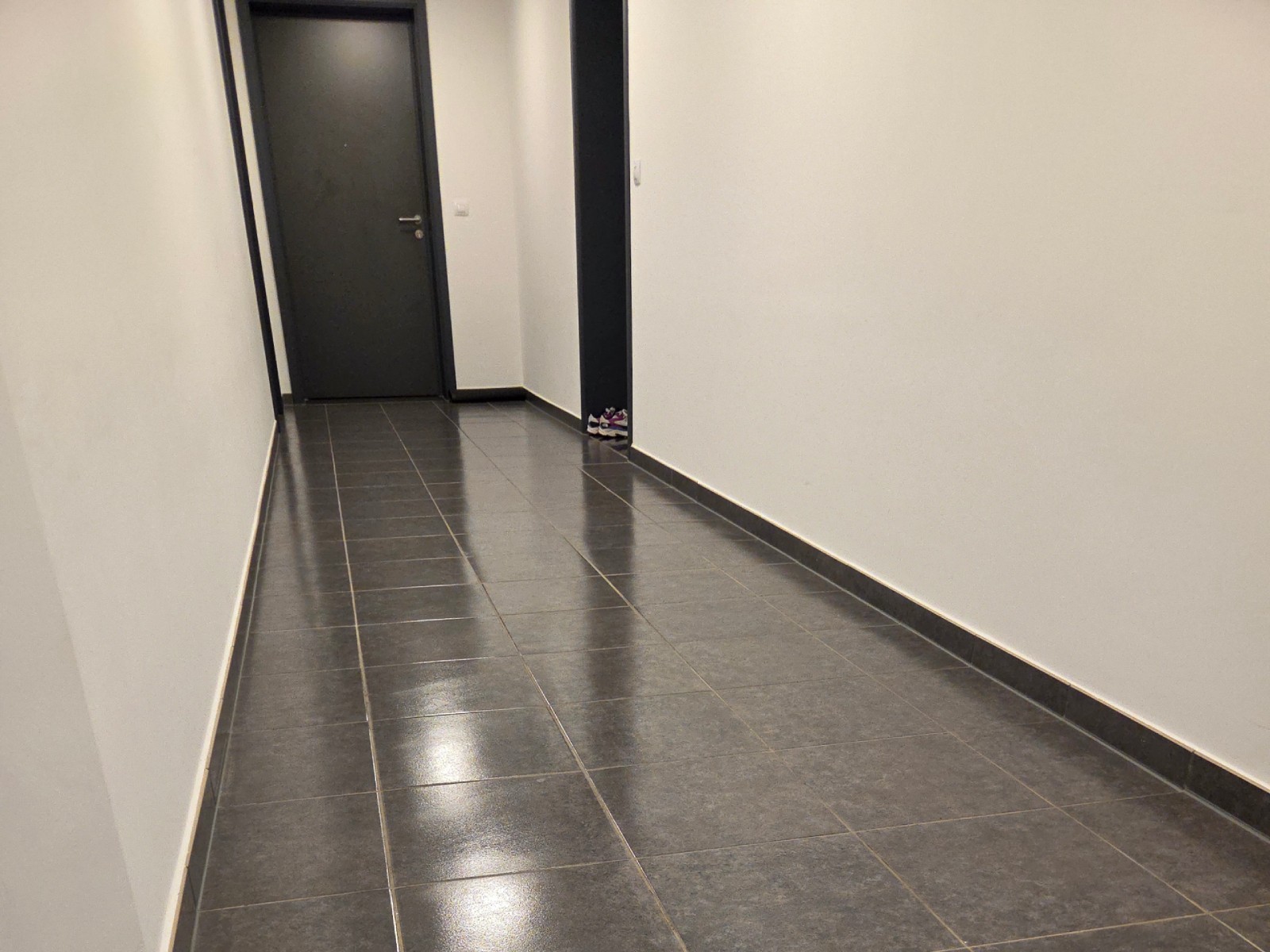 Couloir de communs d'immeubles à Erpent